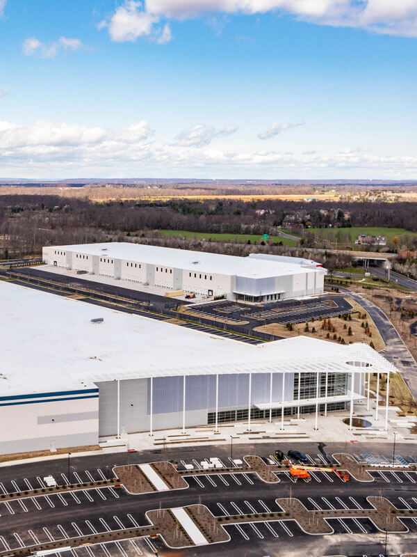 aerial view of two warehouse buildings